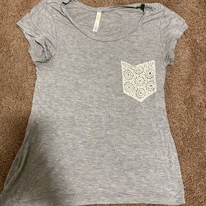 grey shirt with lace pocket